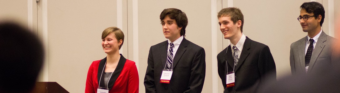 students at thesis conference